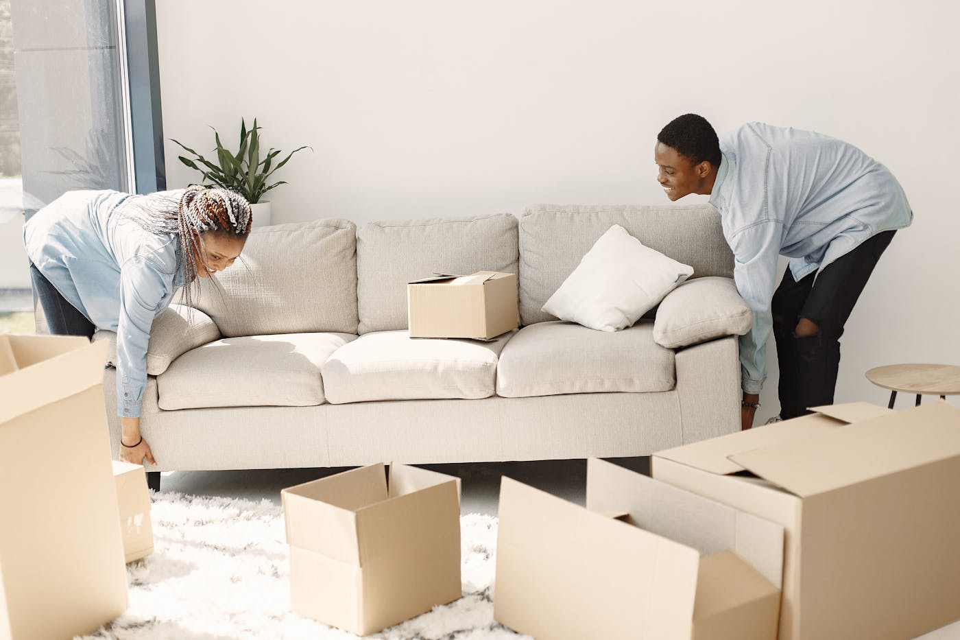 The Moving General movers wrapping furniture
